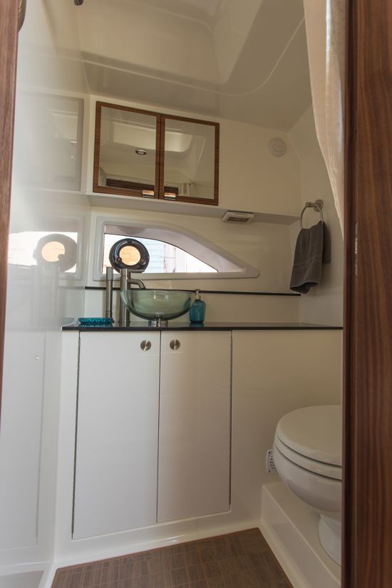 Sea-Ray-Sundancer-320-OB-bathroom-with-vanity-electric-toilet-and-shower