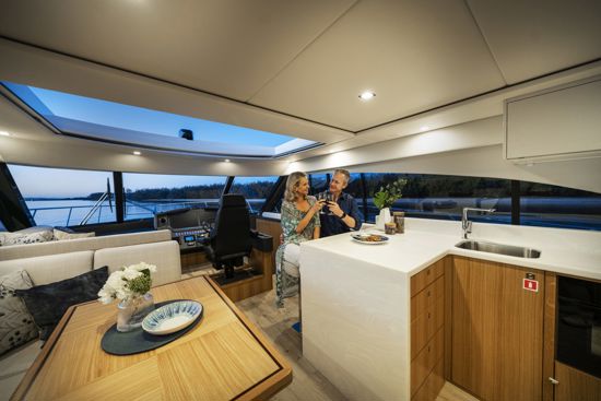 toasting-in-the-saloon-of-the-riviera-sport-yacht-5400