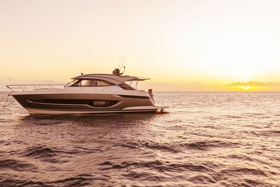 anchored-riviera-sport-yacht-4600-at-sunset
