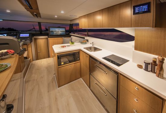 39-open-flybridge-galley-with-oak-timber-finish