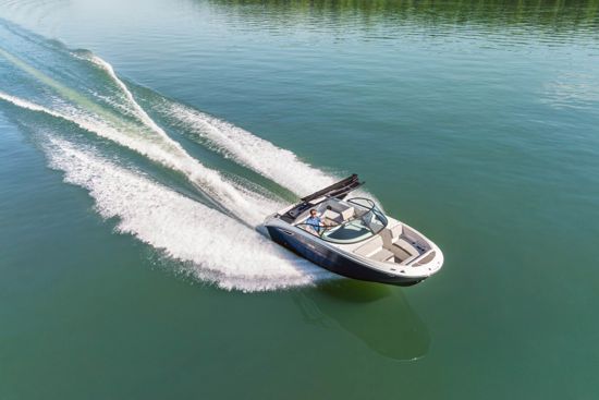 Sea Ray 230 SDX OB cruising at high speed on open water