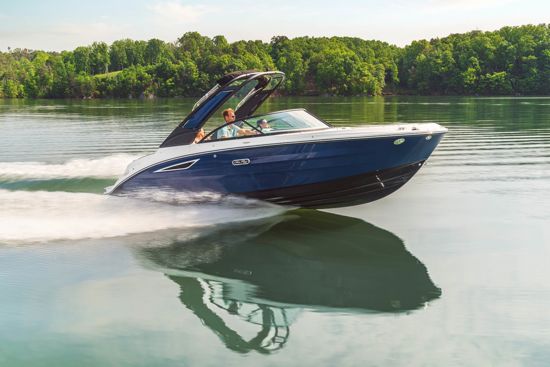 Sea Ray 230 SDX OB in motion with passengers enjoying the ride