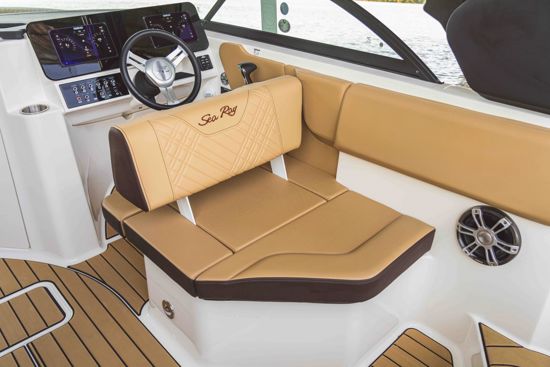 Sea Ray 230 SDX OB cockpit with luxury leather captain's seat and steering wheel