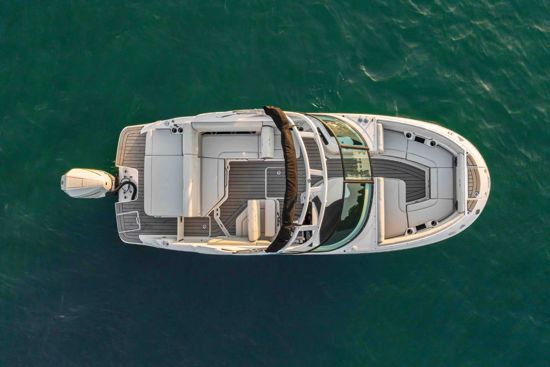 Sea Ray 230 SDX OB anchored on calm waters